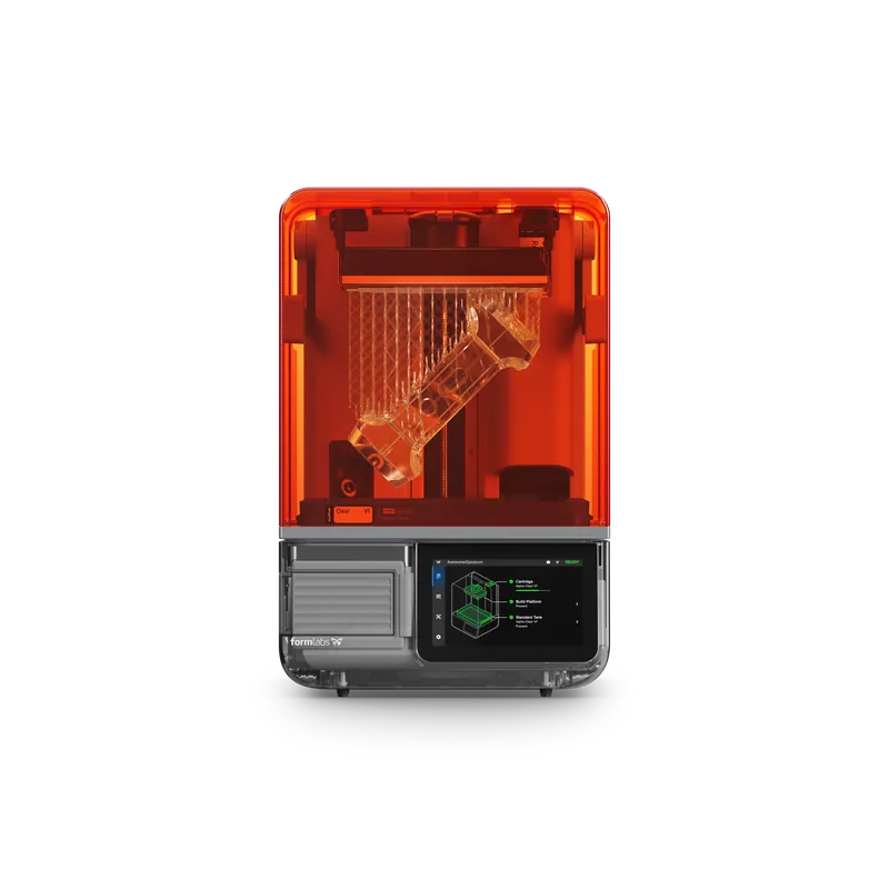Form Studio 1 у кольорі Graphite, вигляд спереду: помаранчева кришка, прозора деталь на платформі, сенсорний екран